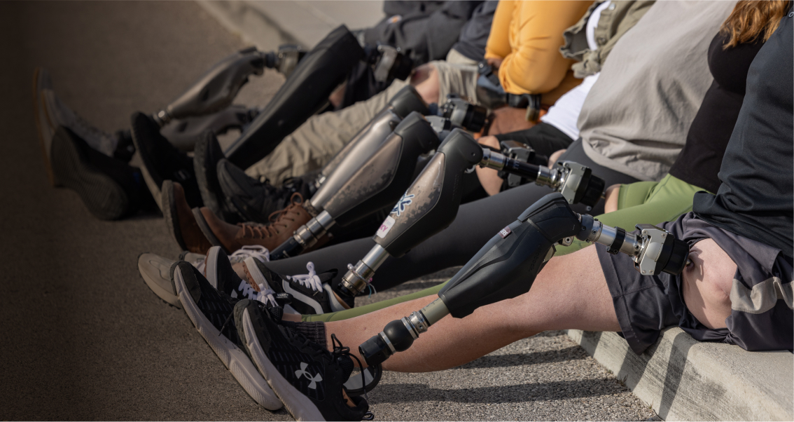 Current users of the OPRA™ Implant System patient sitting by curb.